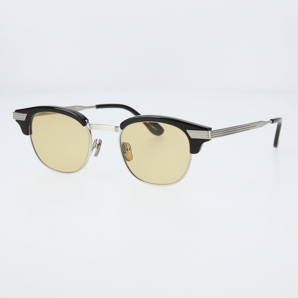 keith  black × silver yellow lens