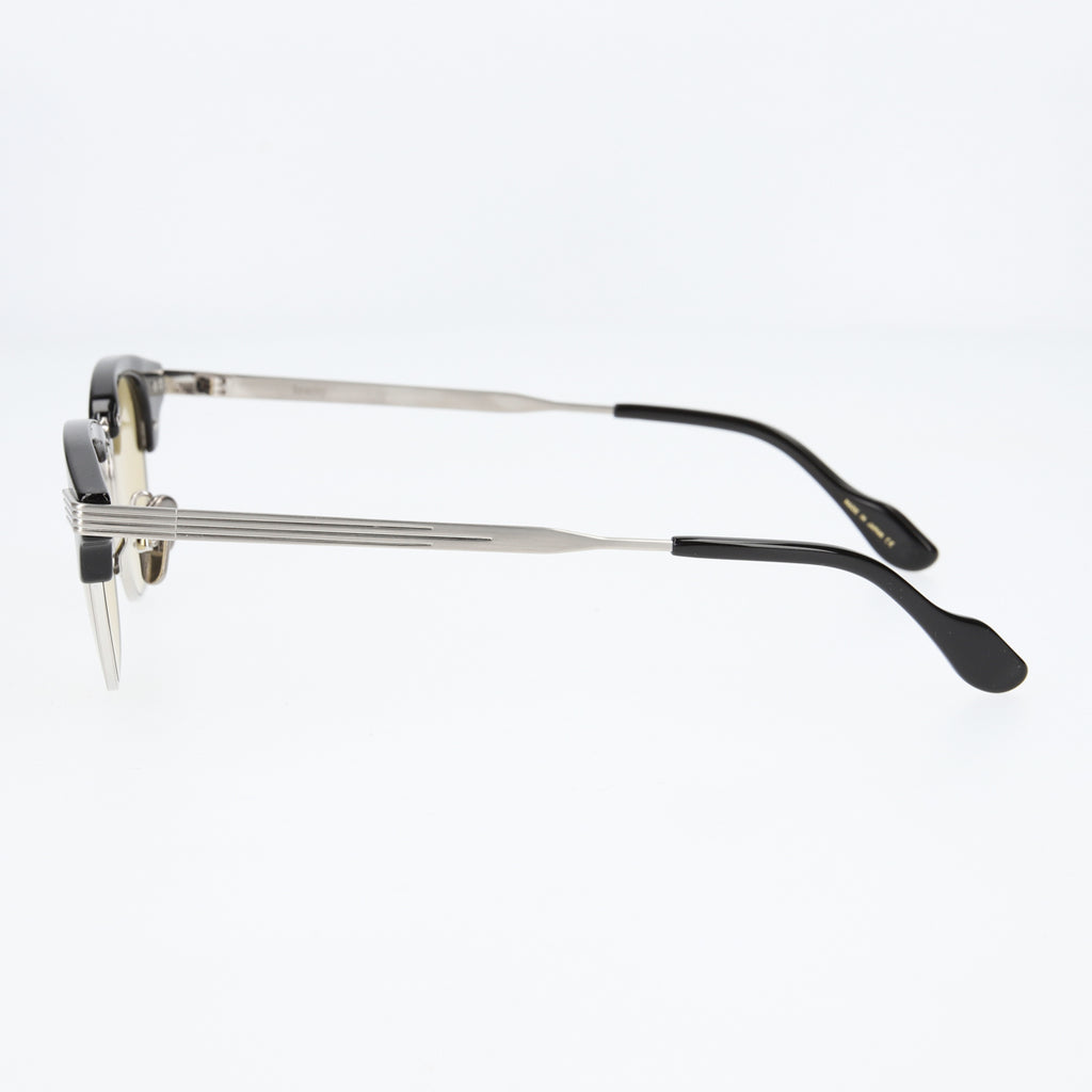 keith  black × silver yellow lens