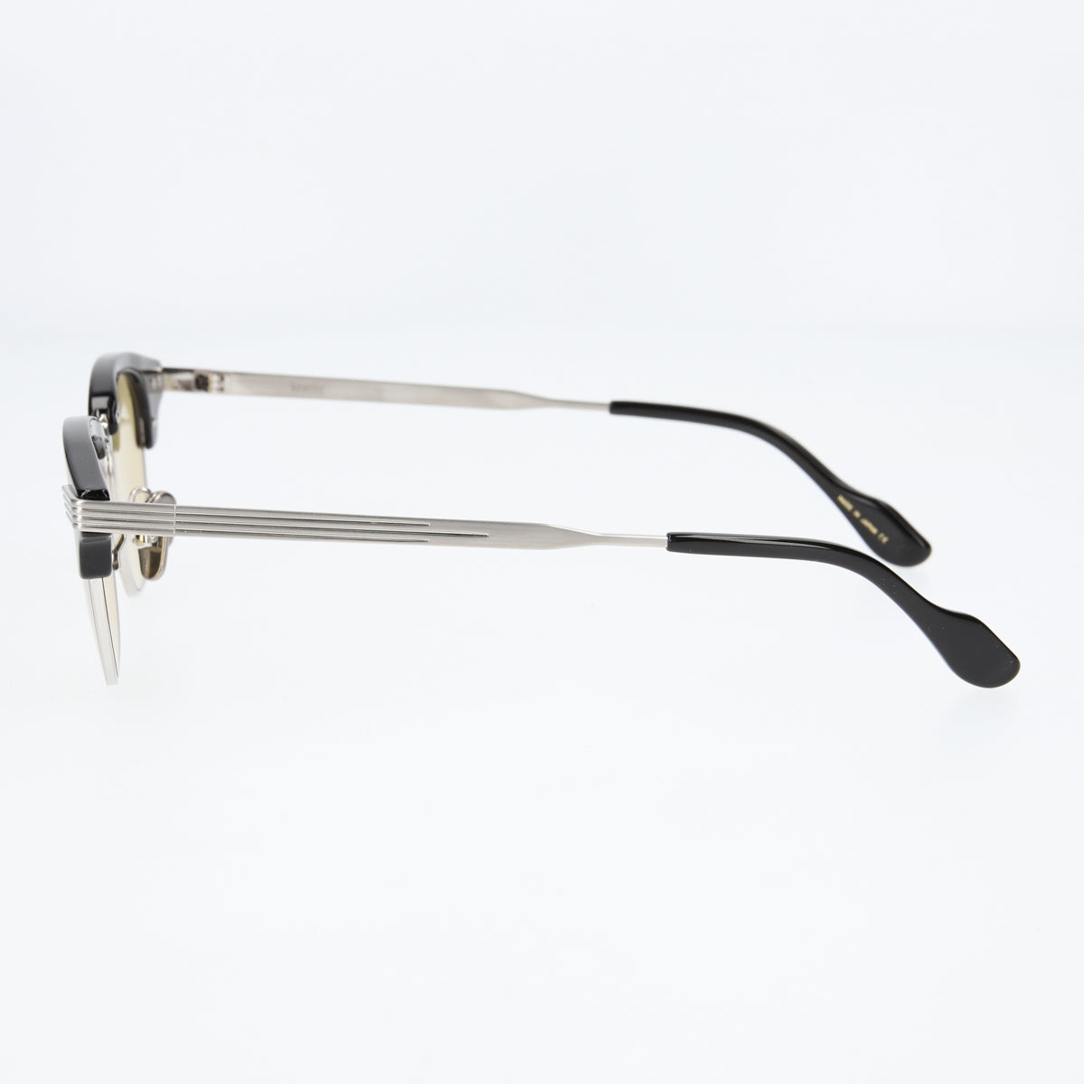 keith  black × silver yellow lens