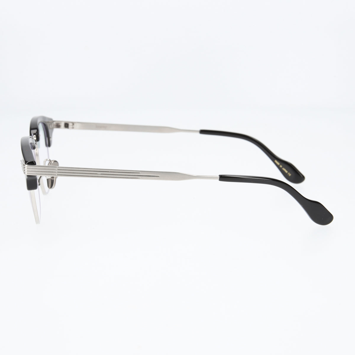 keith  black × silver clear lens