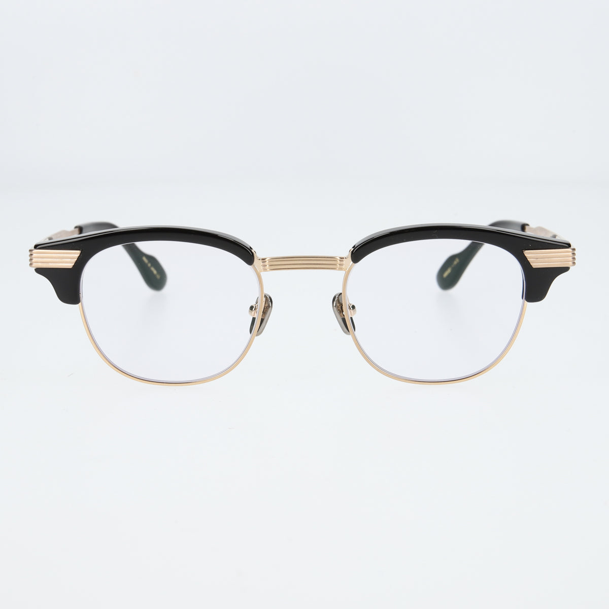 keith  black × gold  clear lens