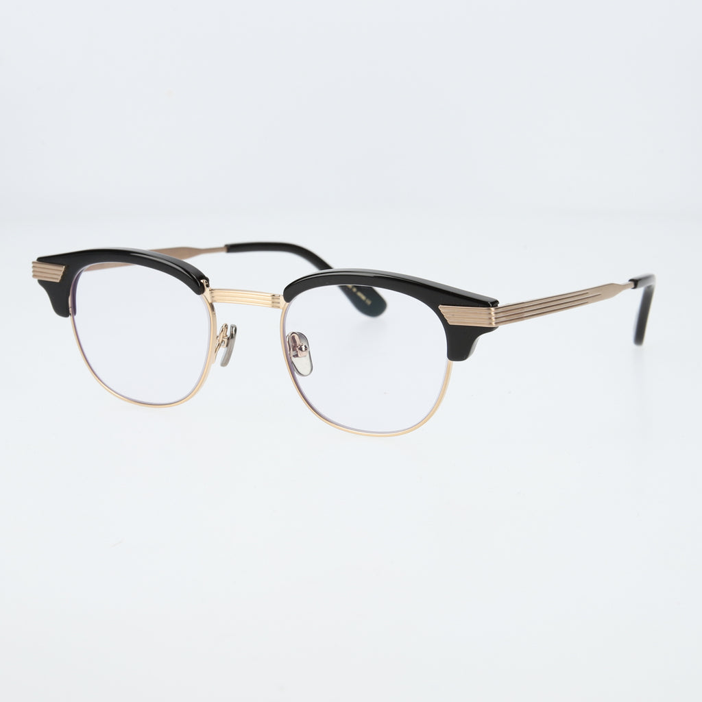 keith  black × gold  clear lens