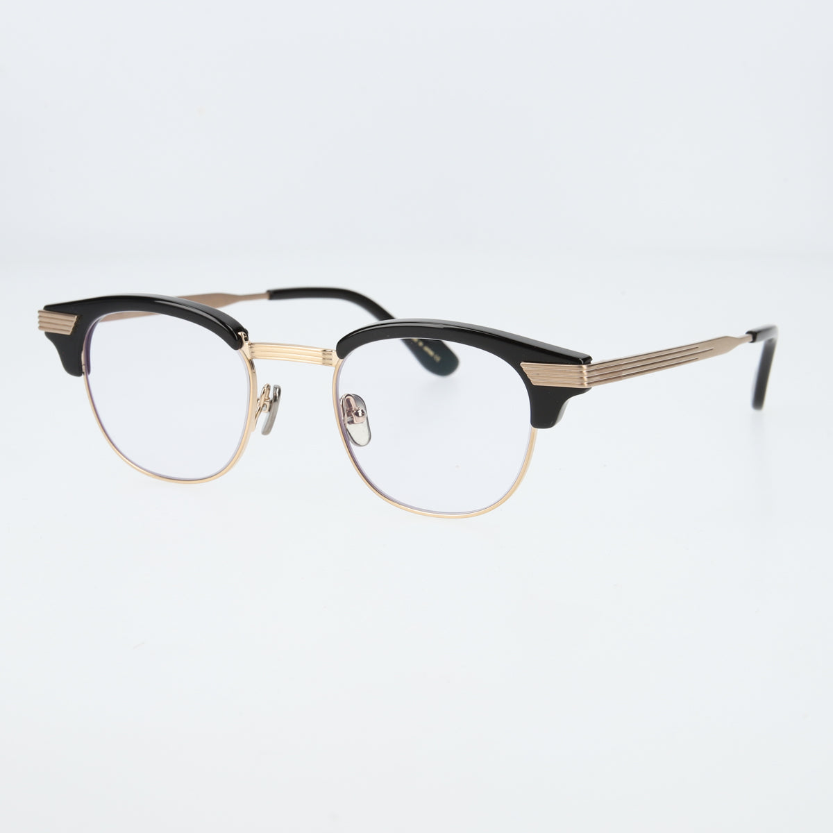 keith  black × gold  clear lens