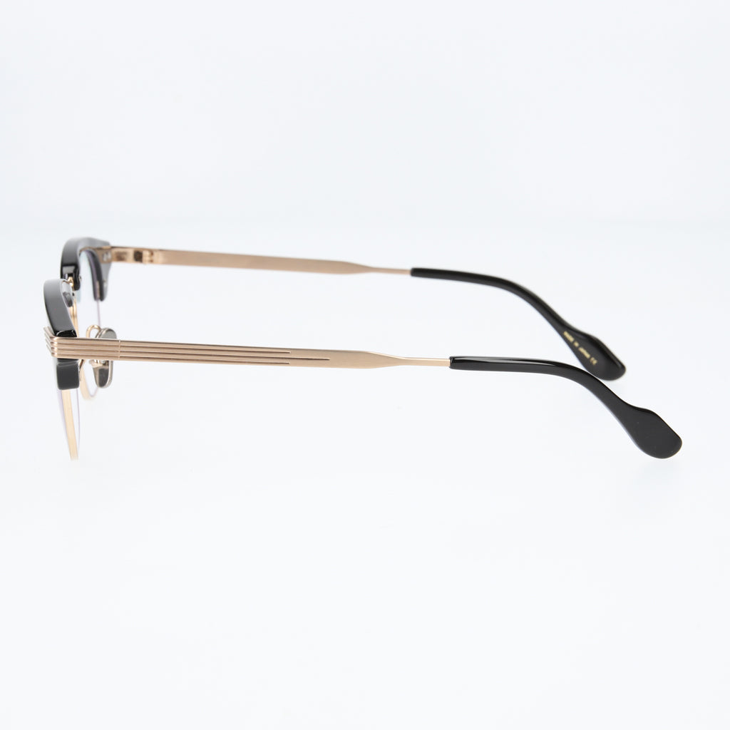keith  black × gold  clear lens